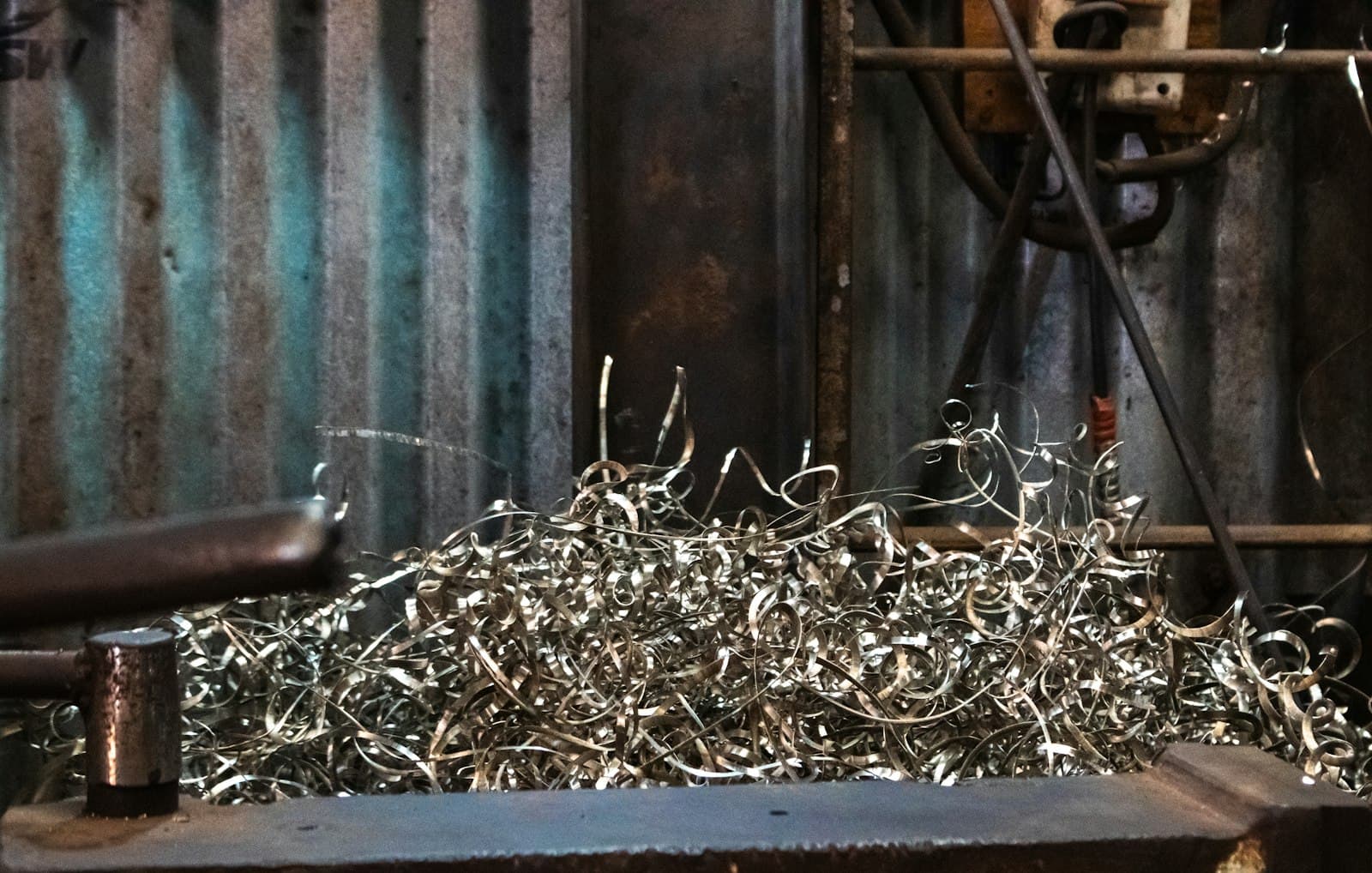 Metal shavings piled on a workbench